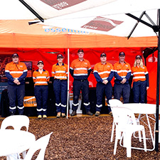 Essential Energy employees standing in front of a display at Primex