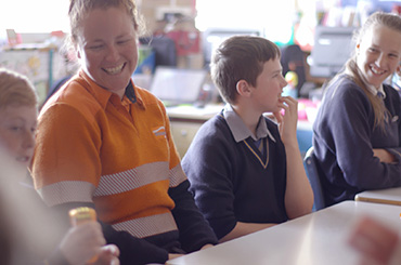 Powerline worker visiting school