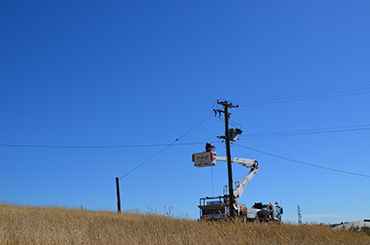 Crew repairing a powerline