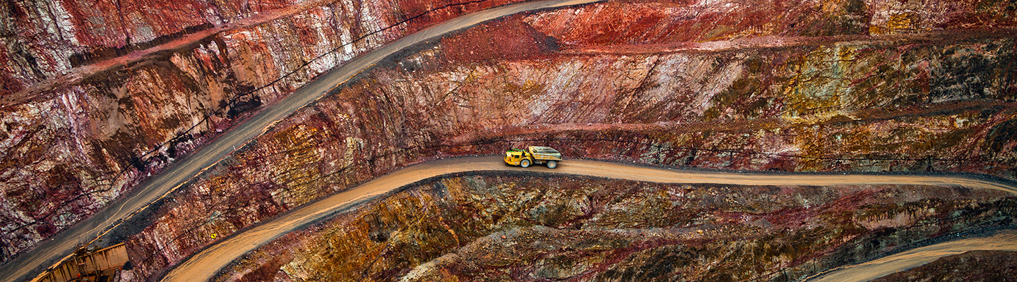 Yellow truck on open cast mine