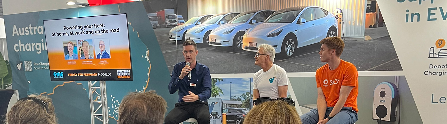 3 panel members discussing electric vehicles