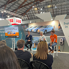3 panel members discussing electric vehicles