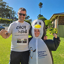 Two people smiling at the camera