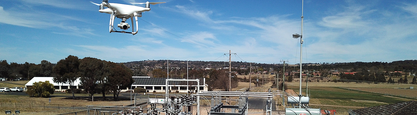 Drone flying over zone substation