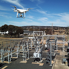 Drone flying over zone substation