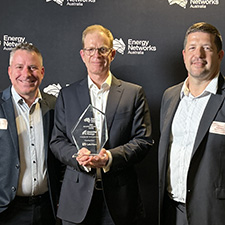 Brad, John and Scott with an award