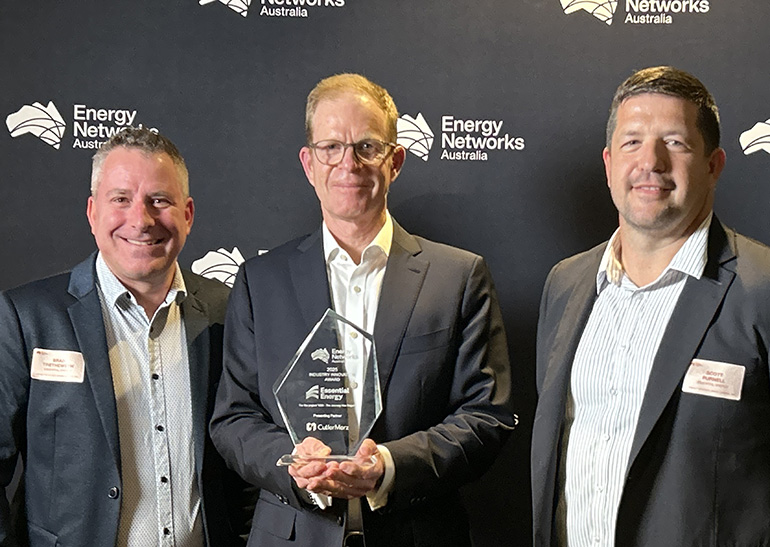 Brad, John and Scott with an award
