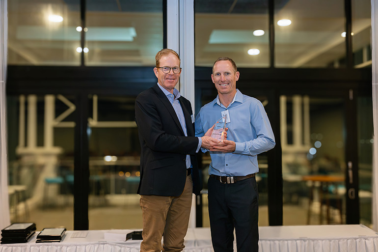 Essential Energy CEO John Cleland with Apprentice and Trainee of the Year Andrew George. Photo Lucy Humphries Photography