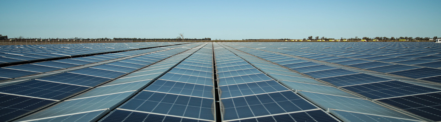 Solar panels under a blue sky