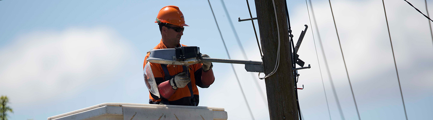 Working on a streetlight