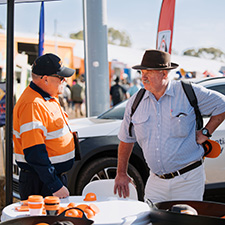 Employee talking to community member