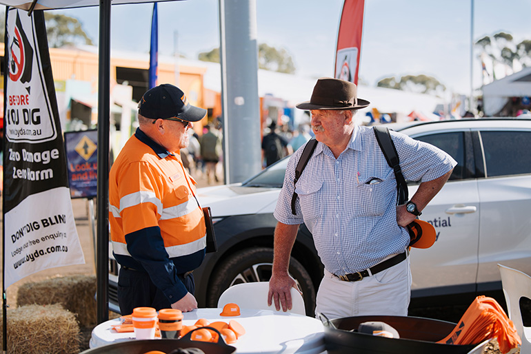Employee talking to community member