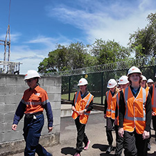 Students and employee walking through depot