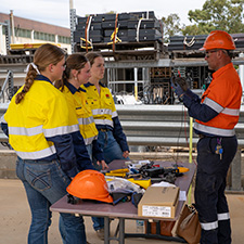 Students watching an electrical demonstration