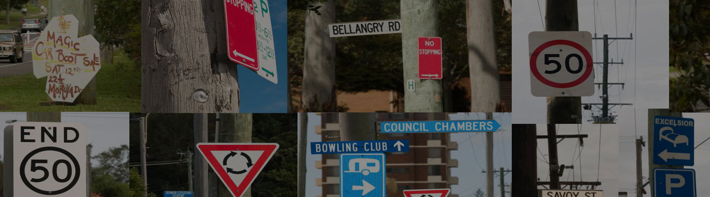 multiple signs on poles