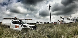 Trucks in a field near Harrington