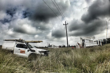 Trucks in a field near Harrington