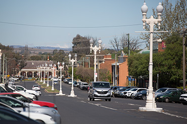 Street with cars and streetlights